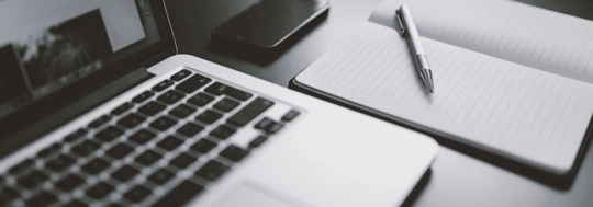 computer and desk notes