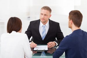 divorce attorney talking to clients